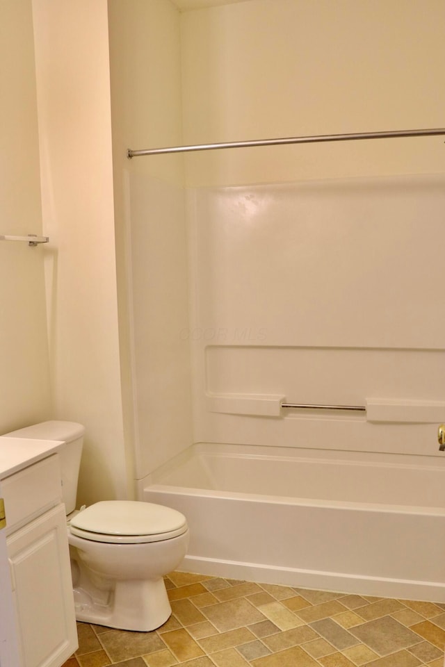 full bathroom featuring shower / tub combination, toilet, and vanity