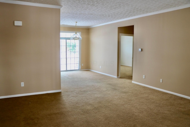 empty room with crown molding and carpet floors