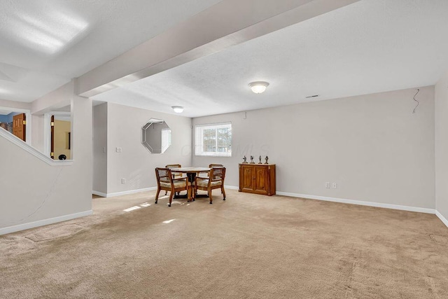 view of carpeted dining area