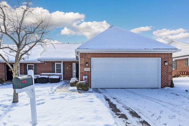 ranch-style home with a garage