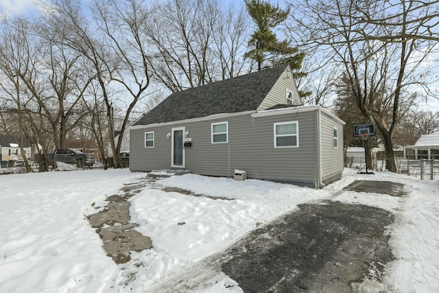 view of snow covered house