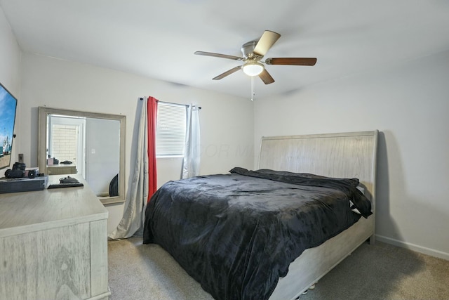 bedroom with ceiling fan and light carpet