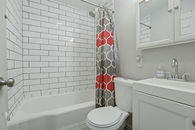 full bathroom with toilet, shower / bath combo with shower curtain, and vanity