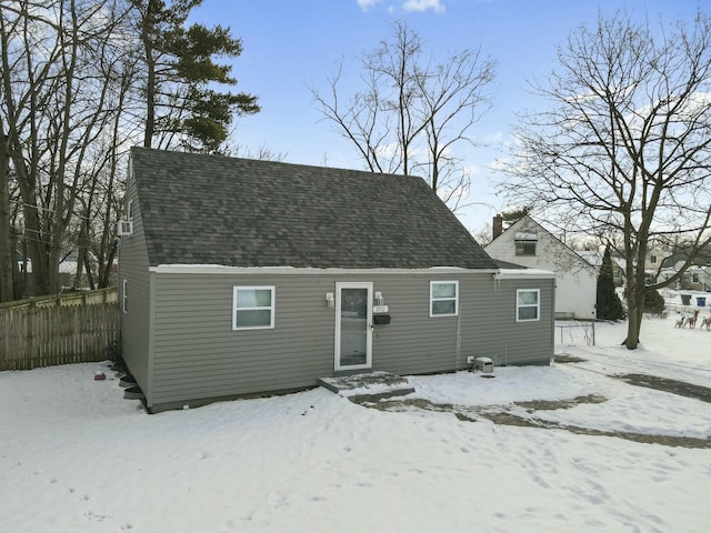 view of snow covered house