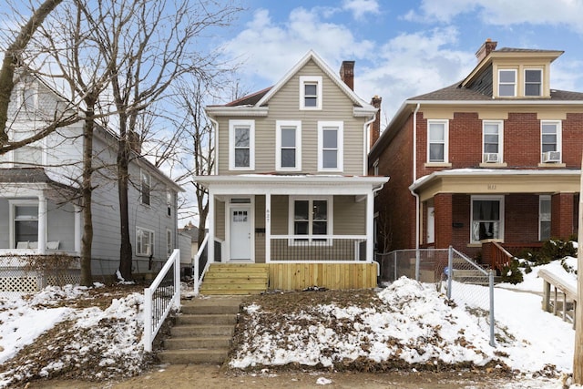 front of property featuring covered porch