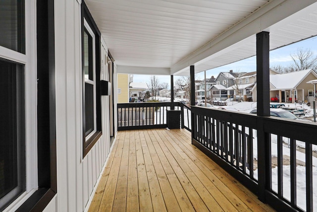 view of snow covered deck