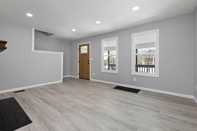 foyer featuring light wood-type flooring