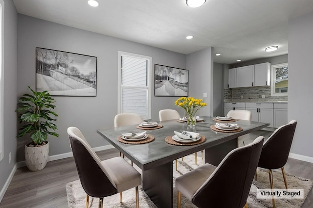 dining room featuring wood-type flooring