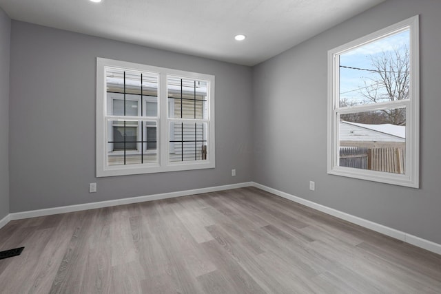 empty room featuring light wood-type flooring