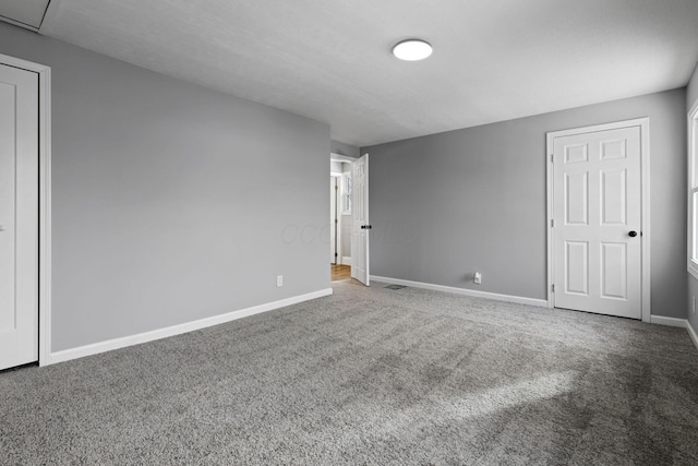 unfurnished bedroom with carpet flooring