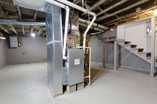 basement featuring electric panel