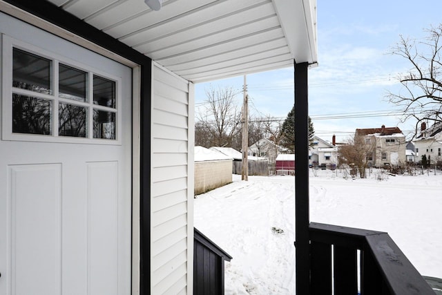 view of yard covered in snow