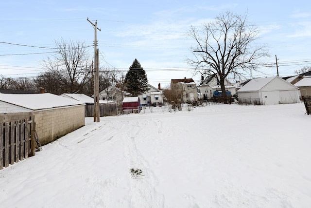 view of yard covered in snow