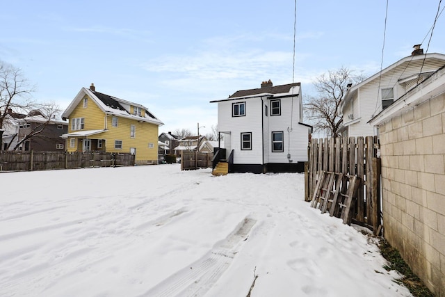 view of snow covered house