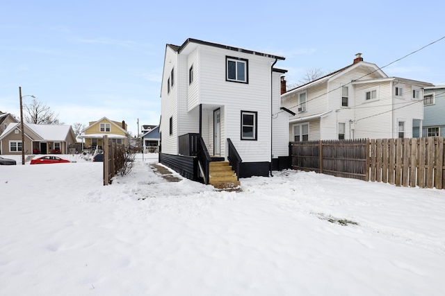 view of snow covered property