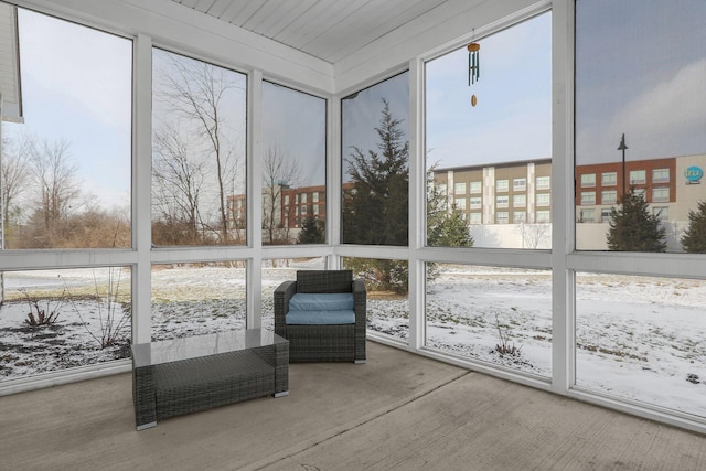 unfurnished sunroom featuring plenty of natural light