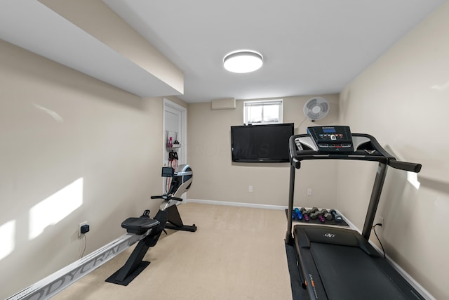 workout area with light carpet