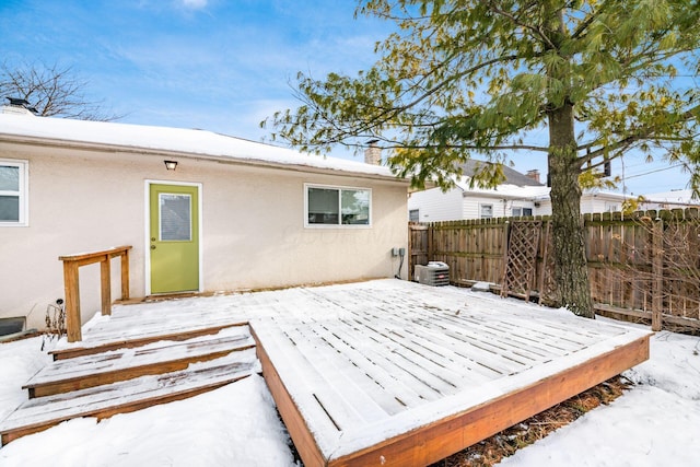 view of snow covered deck