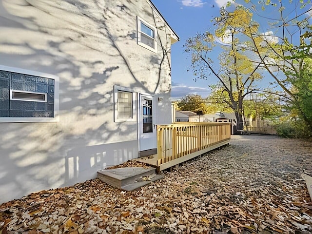 exterior space featuring a wooden deck