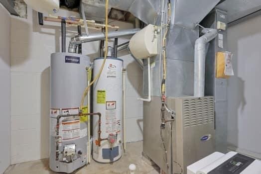 utilities with heating unit and gas water heater