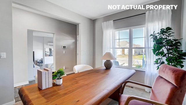 dining room with plenty of natural light