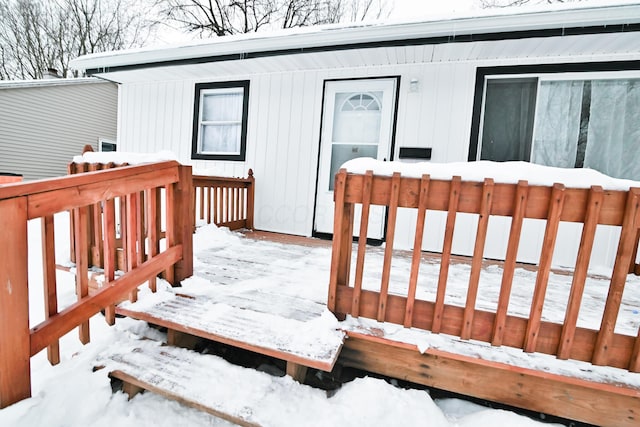 view of snow covered deck