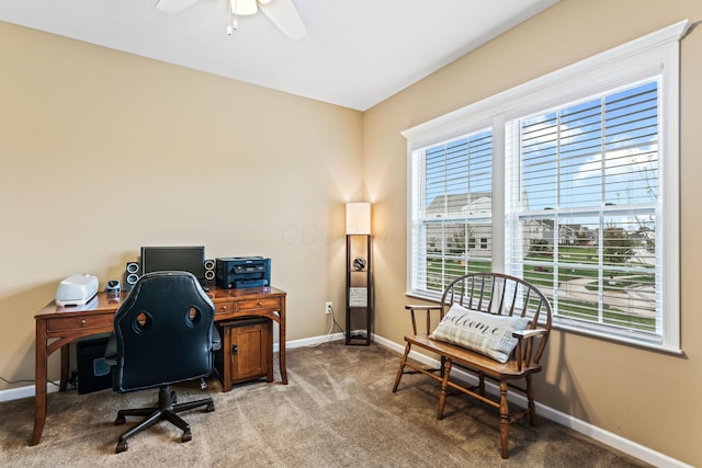 office area with carpet flooring and ceiling fan