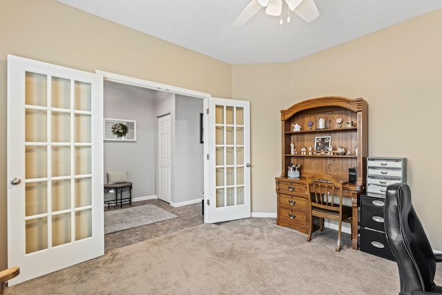 carpeted home office featuring ceiling fan and french doors