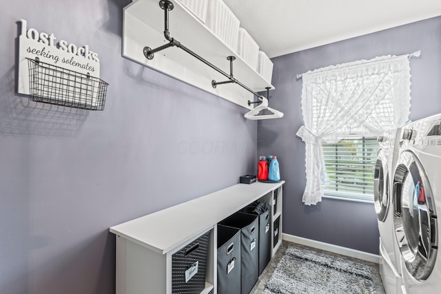 laundry room featuring separate washer and dryer