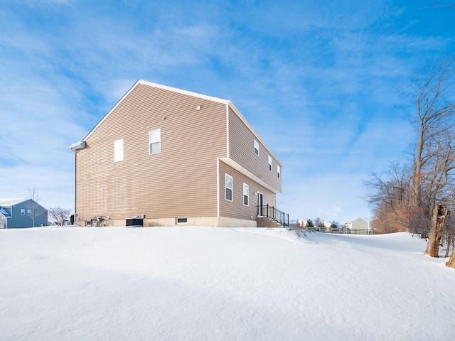 view of snow covered property