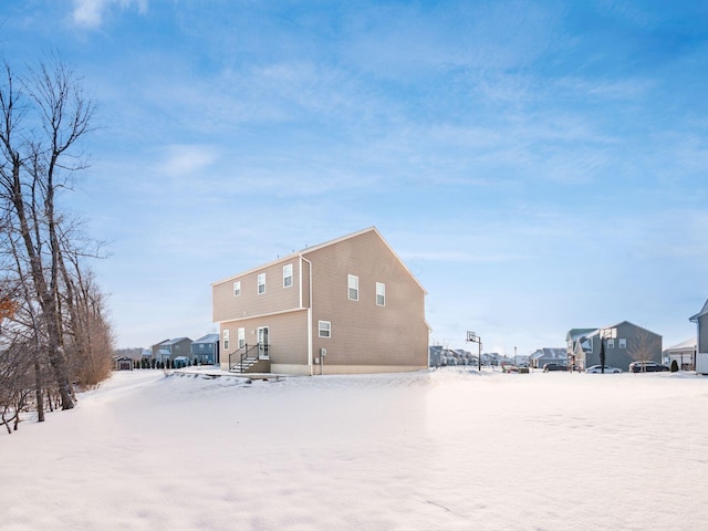 view of snow covered property