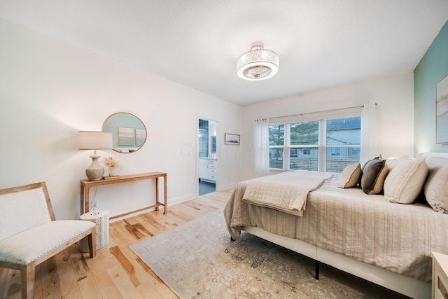 bedroom featuring wood-type flooring