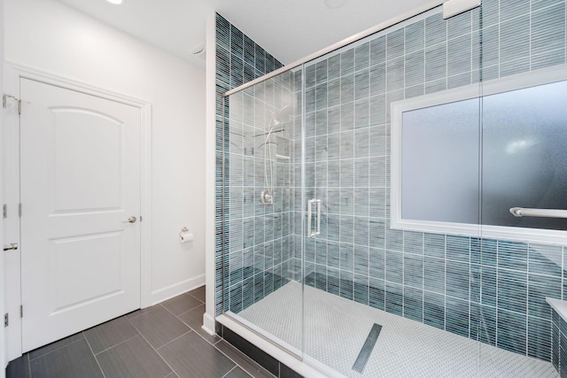 bathroom featuring an enclosed shower