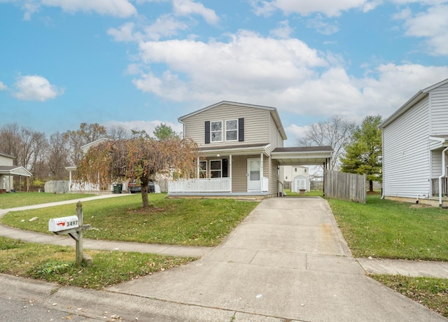 front facade with a porch, a carport, and a front lawn