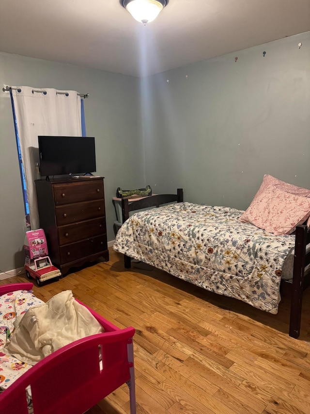 bedroom featuring light hardwood / wood-style flooring