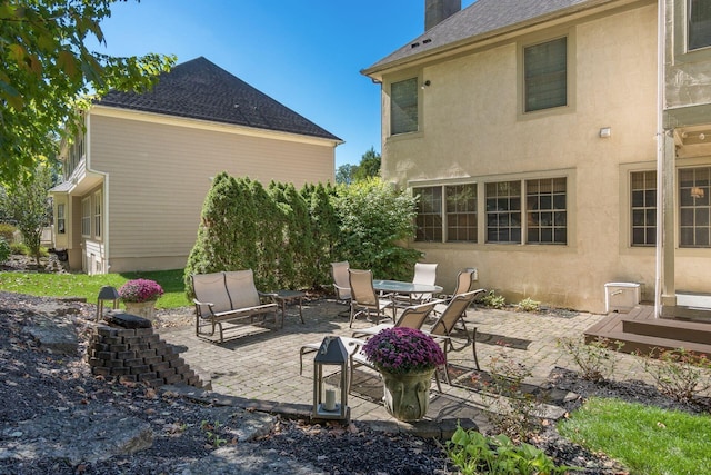 back of property with a patio area