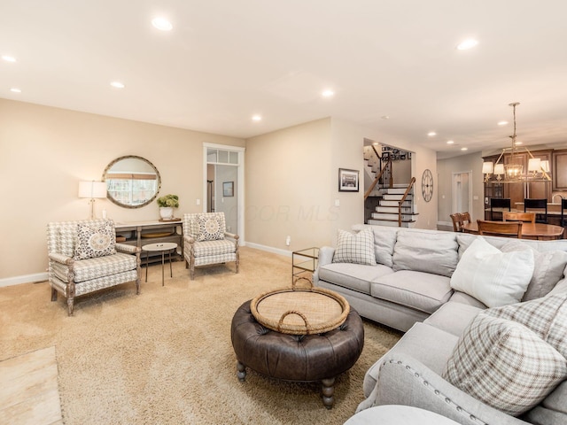 living room featuring a notable chandelier