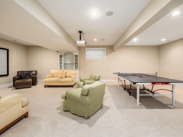 playroom featuring carpet and built in shelves