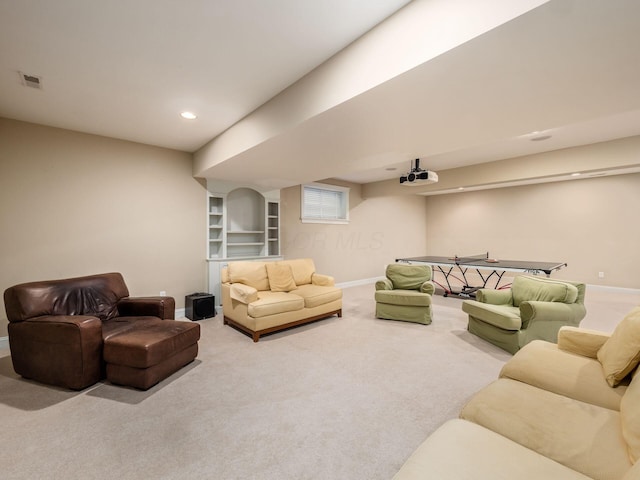 carpeted living room featuring built in features