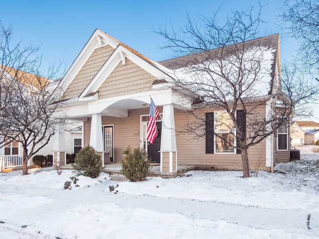 view of front of house featuring central air condition unit