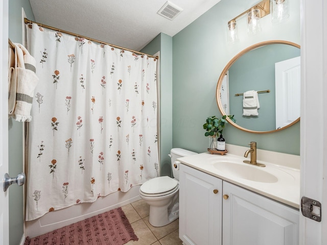 full bathroom with toilet, vanity, tile patterned floors, a textured ceiling, and shower / tub combo with curtain