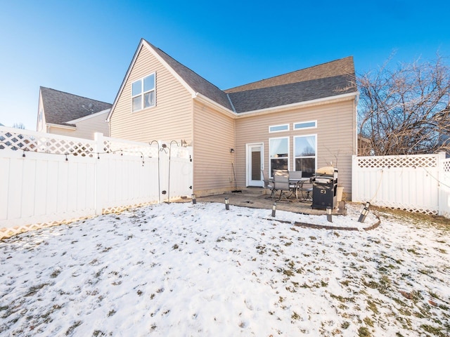 view of snow covered property