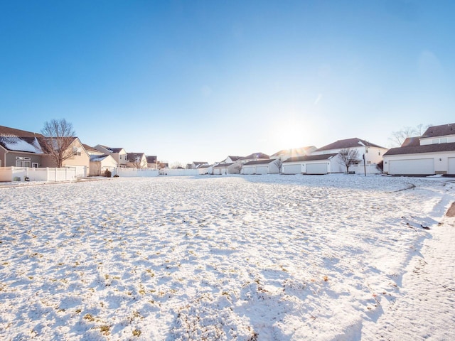 view of yard covered in snow