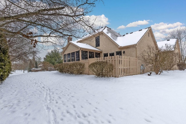 view of snow covered property