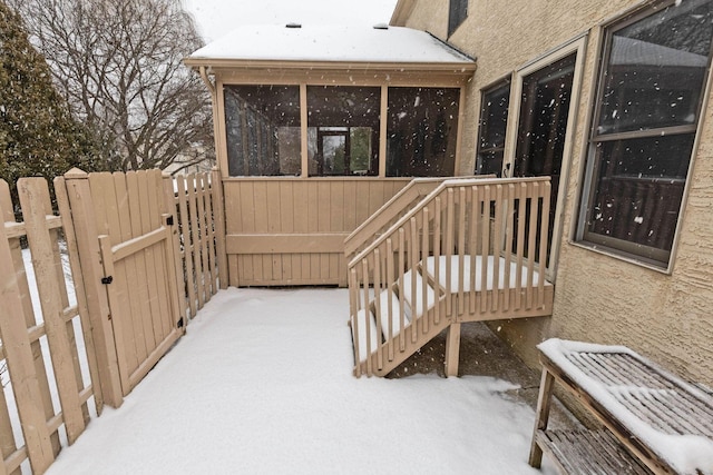 view of snow covered deck