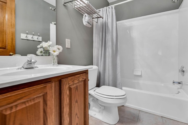 full bathroom featuring toilet, tile patterned flooring, shower / tub combo, and vanity