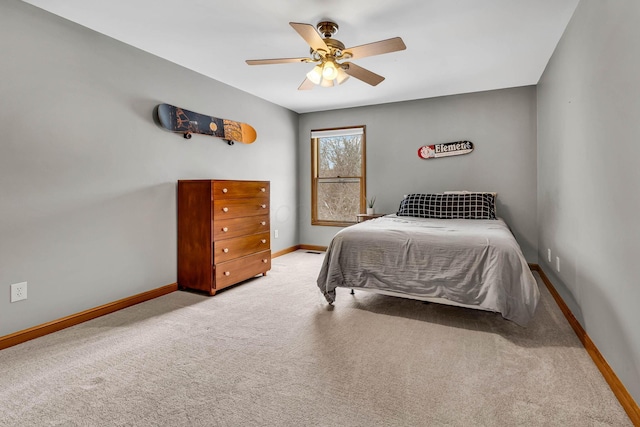 bedroom featuring ceiling fan and light colored carpet