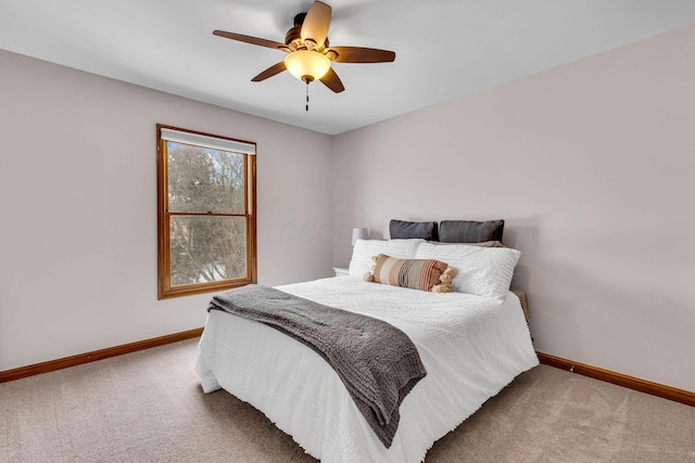 bedroom with ceiling fan and carpet flooring