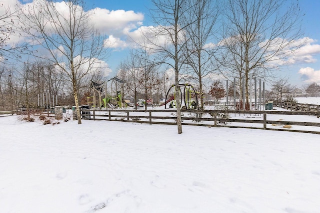 view of yard layered in snow