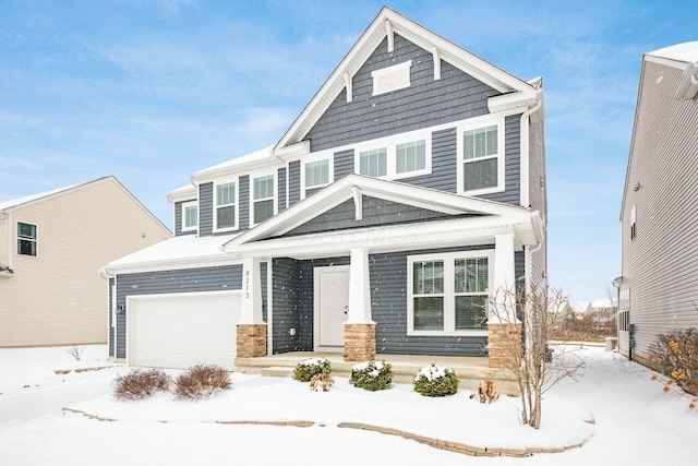 craftsman-style home featuring a garage